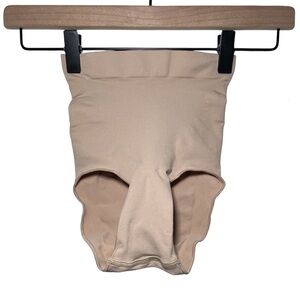 SKIMS Seamless Sculpt Mid Waist Brief in Clay